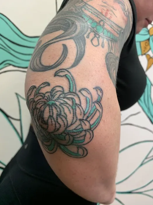 Rooted Body Tattoo 0