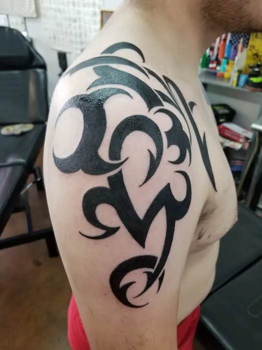 Atomic Tattoos and Piercing 1
