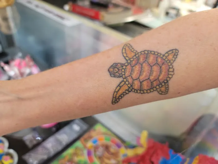 A.R.T. Armadillo Reds Tattoo East Kissimmee 1