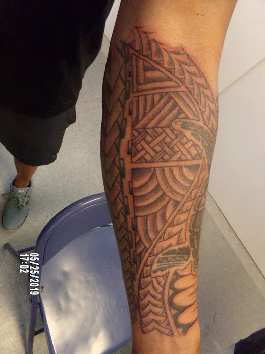 Barfield’s tattoo and piercing 4