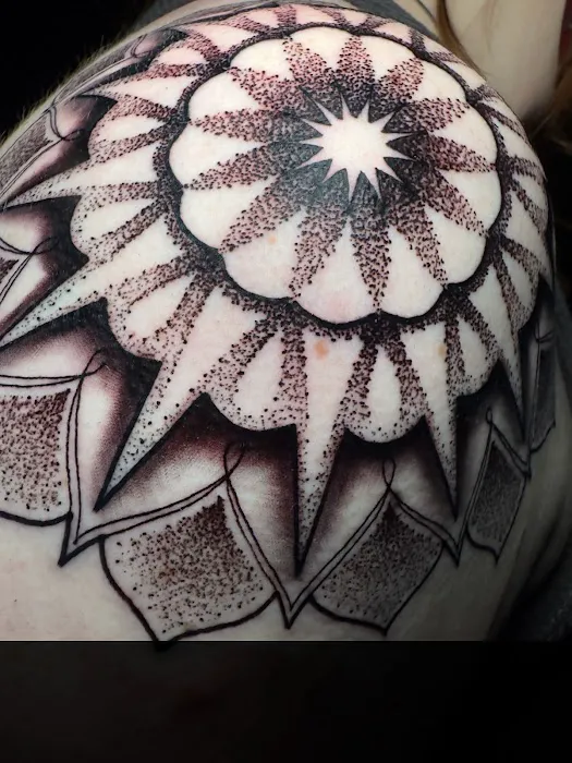 Manitou Tattoo 8
