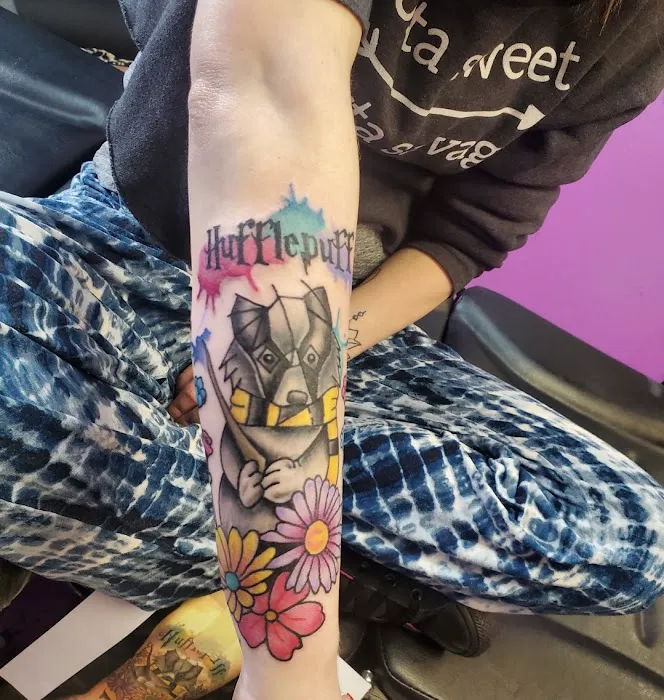 Flying Dagger Tattoo and Piercing 6
