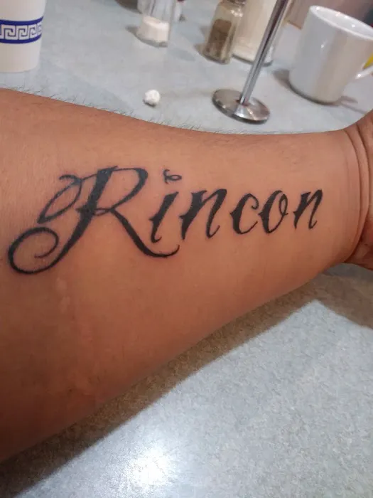 Q Tattoo 1