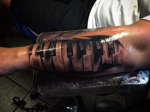 Q Tattoo 5
