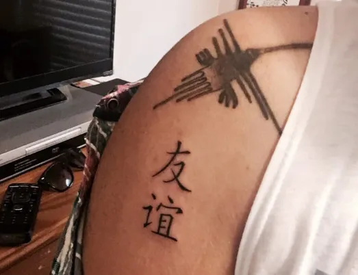 Q Tattoo 3