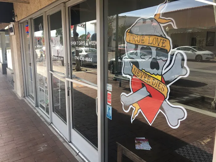 Black Umbrella Tattoo and Art Gallery 6