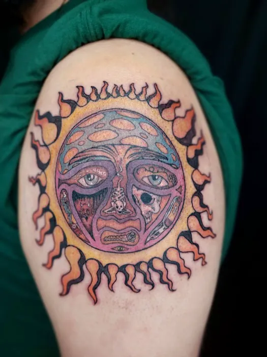 Saturn Luxury Tattoo 1