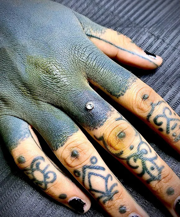 Symbiosis Body Piercing 4