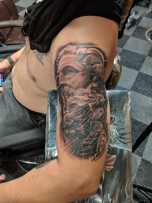 Uptown Tattoos & Piercing 6