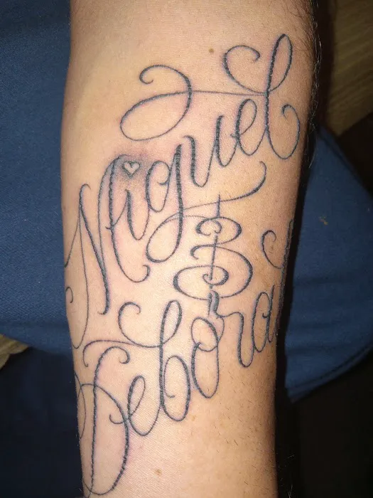 Uptown Tattoos & Piercing 5