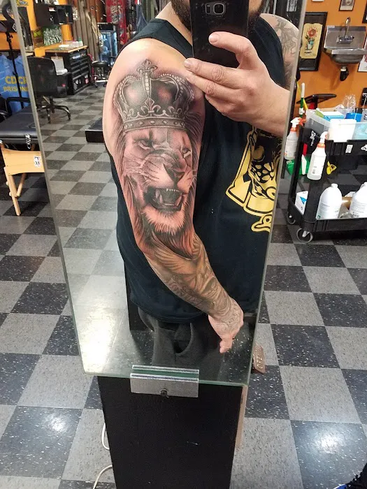 Uptown Tattoos & Piercing 0