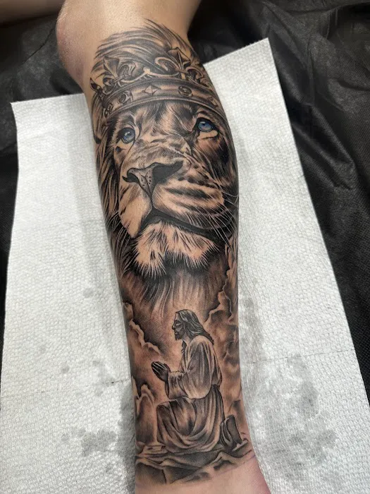 Raining Ink Tattoo Studio 0