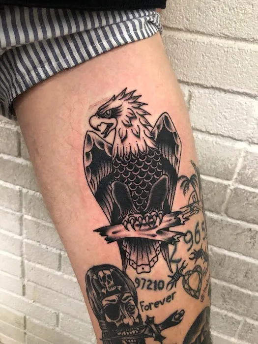 Rise Above Tattoo Co. 4