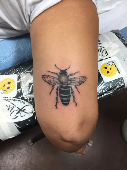 Rise Above Tattoo Co. 1