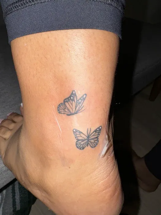 Brown Pride Tattoo & Piercing Shop 0