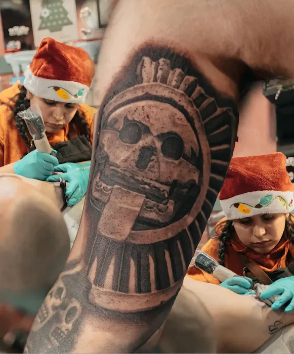 Brown Pride Tattoo & Piercing Shop 1