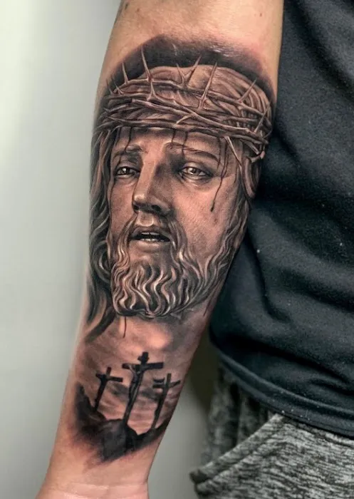Ink Monkey Tattoo and Piercing 0