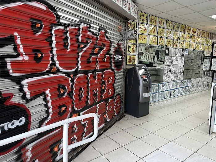 Buzzbomb Tattoo And Body Piercing 6