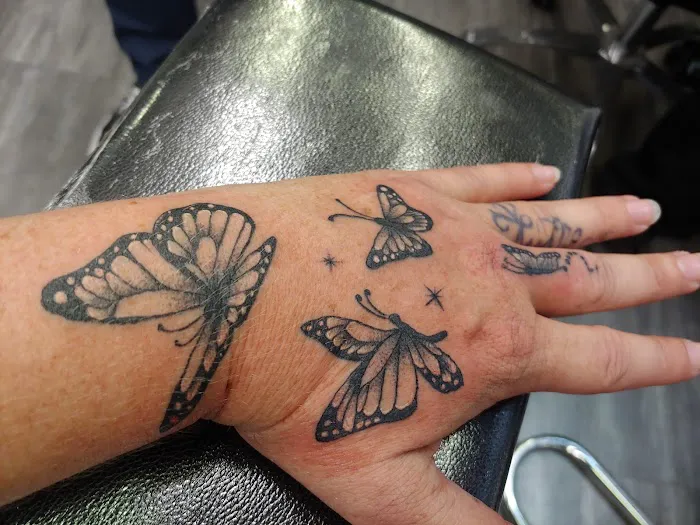 Nathan's Tattoos and Piercings 0