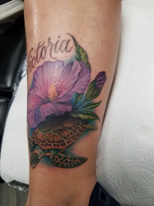 Corona Tattoo & Piercing 9