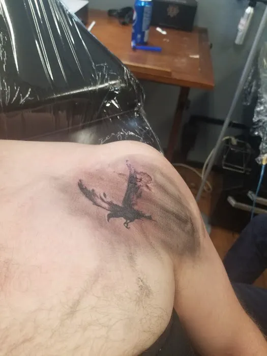 Golden Rooster Tattoo Parlor 5