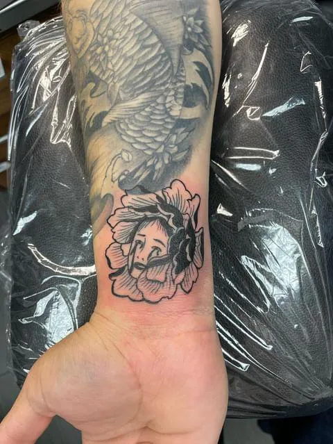 Chicano Tattoo & Piercings 2
