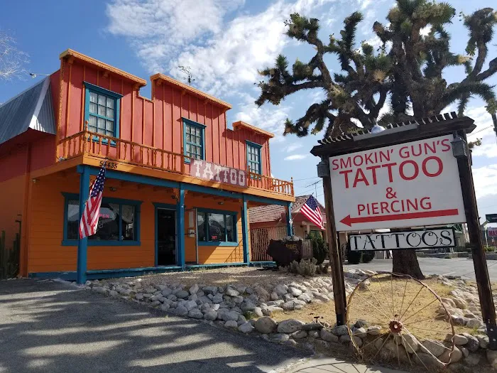 #1 Smokin Guns Tattooz 9