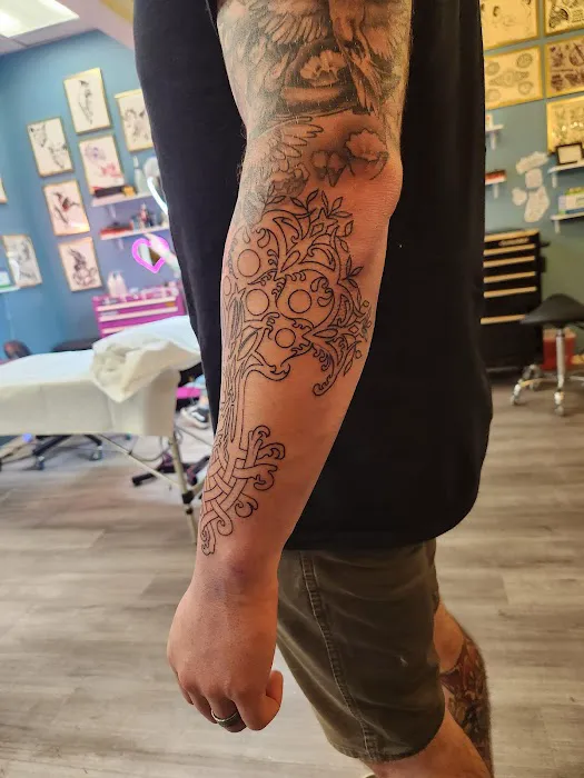 Crimson Arrow Tattoo 8
