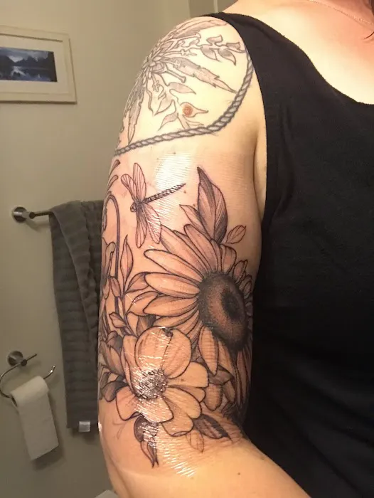 New Rose Tattoo LLC 0