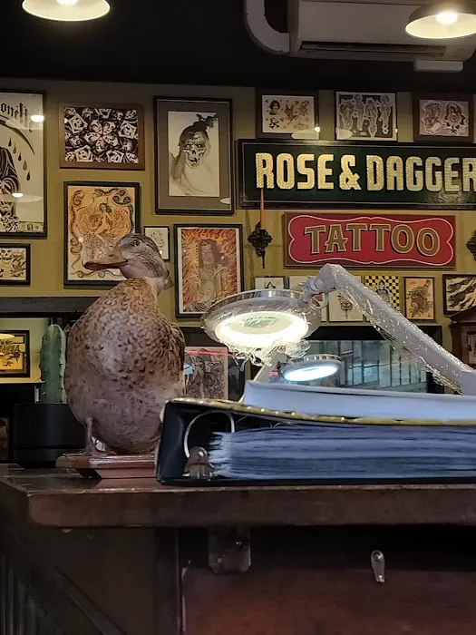 Rose & Dagger Tattoo 0