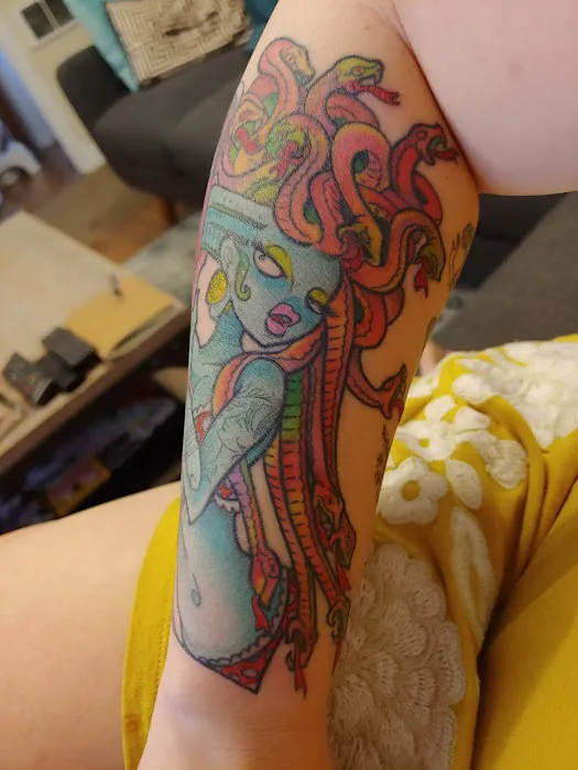 Slave to the Needle Tattoo & Body Piercing 9