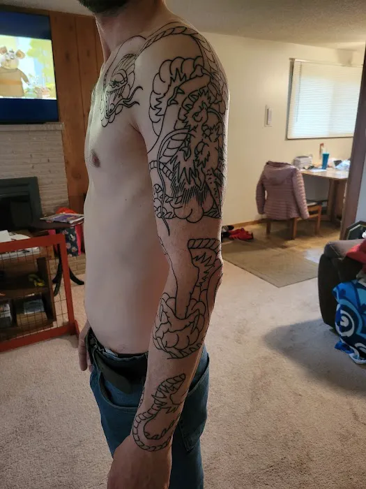 Arrow and Sword Tattoo 7