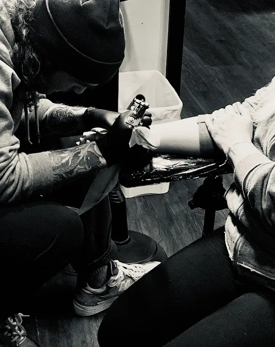 Arrow and Sword Tattoo 6