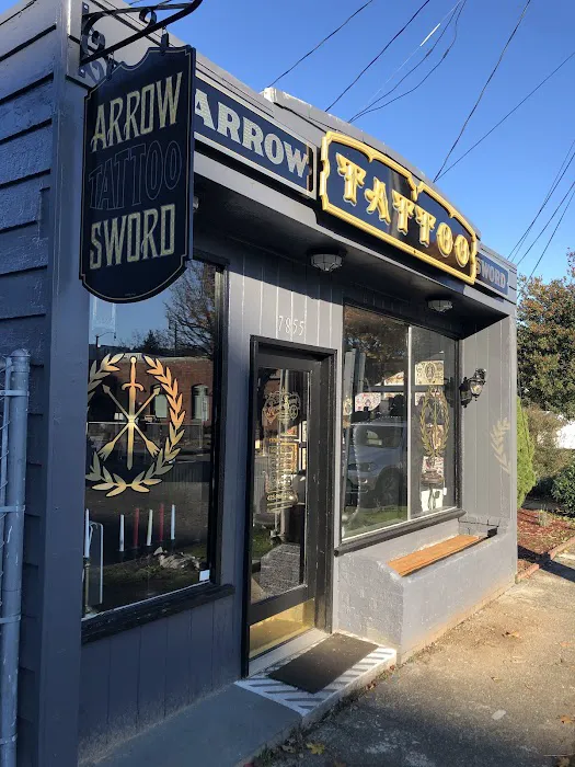 Arrow and Sword Tattoo 9