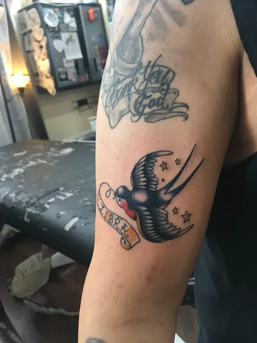 Dark Horse Tattoo 1