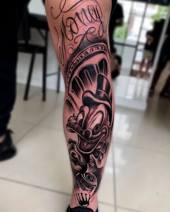 Crown Ink Tattoo and Piercing 1