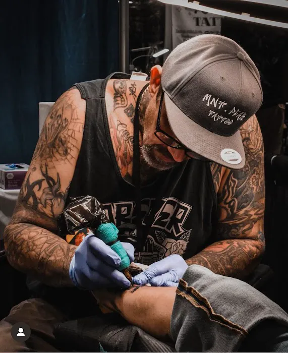Mount Peak Tattoo and Body Piercing 7