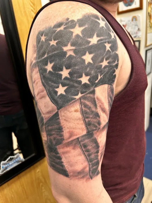 Mount Peak Tattoo and Body Piercing 8