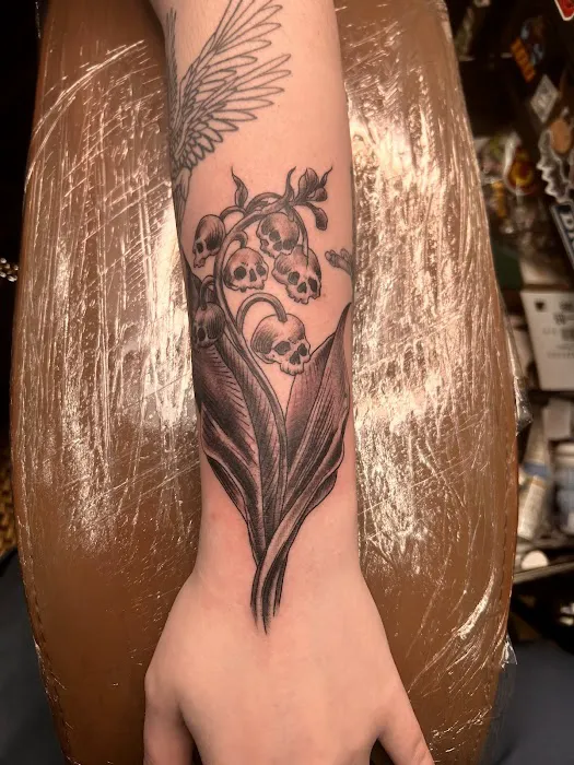 Mount Peak Tattoo and Body Piercing 4