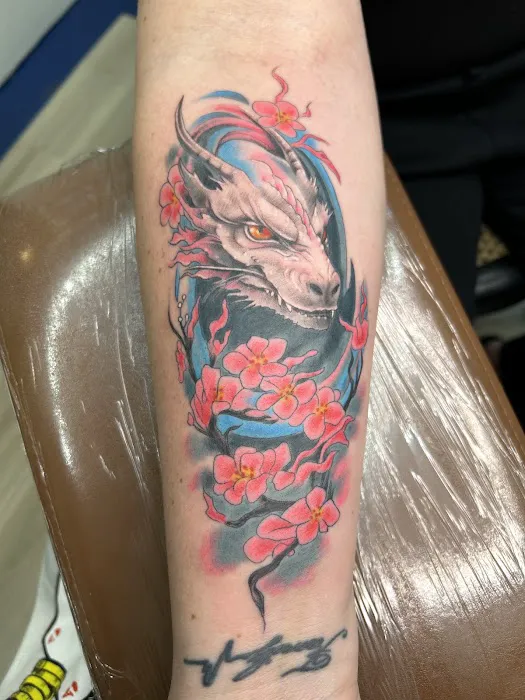 Mount Peak Tattoo and Body Piercing 9