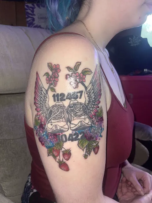 3rd Rock Tattoos and piercings 0