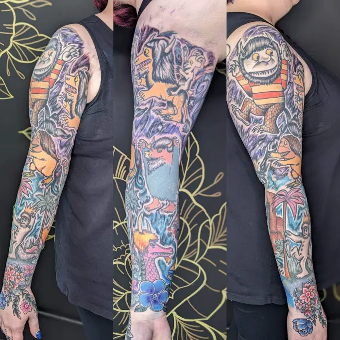 LION'S DEN TATTOO 0