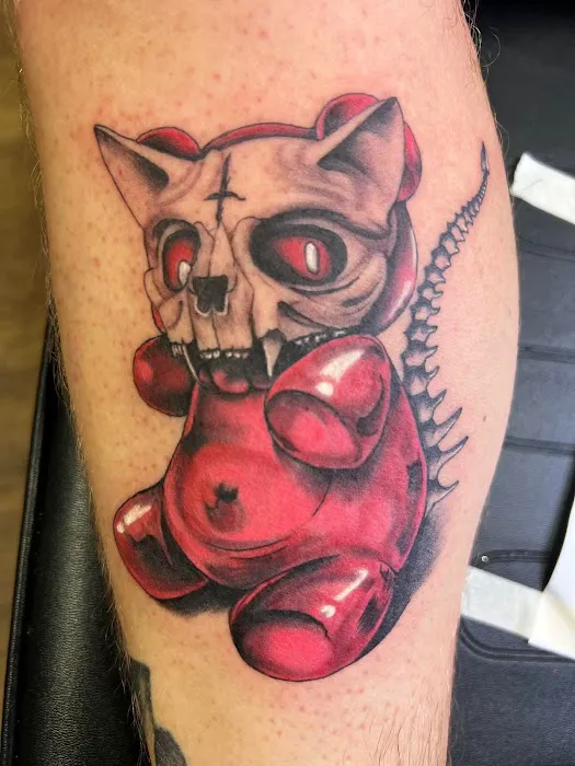 Coup de Gras 2.0 Tattoo and Body Piercing 1