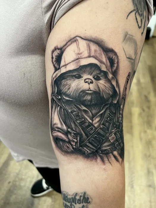 Coup de Gras 2.0 Tattoo and Body Piercing 4