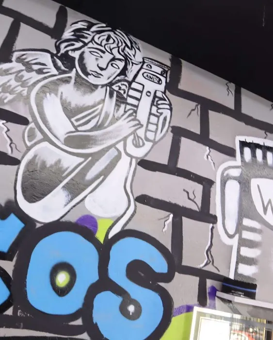 Rico’s Tattoos & Barbershop 6