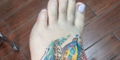 Dark Moon Tattoo and Piercing