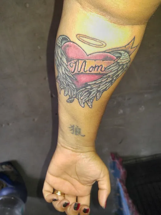 Double Down Tattoo and Body Piercing 0