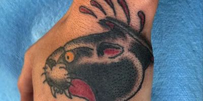 Crawling Squid Tattoo Studio
