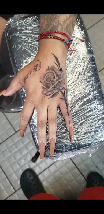 Modest Mastery Tattoo 8