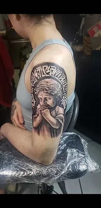 Modest Mastery Tattoo 6